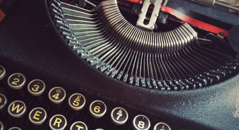 A close up of a very stylish looking typewriter