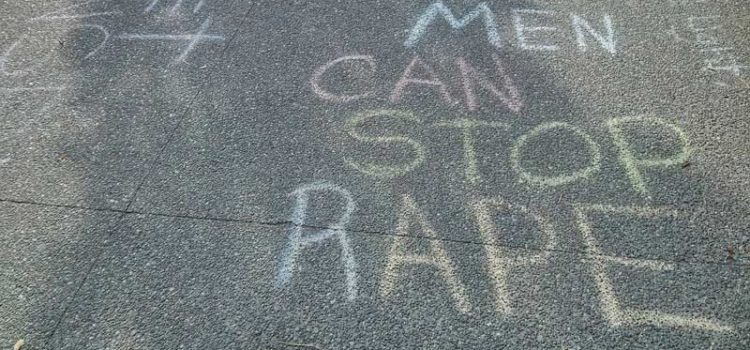 A new semester of the Men’s Circle at UVic Chalk art on the sidewalk says "Men can stop rape"