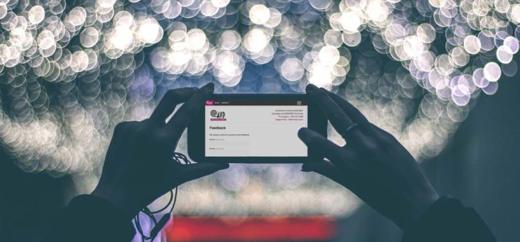 We get feedback on our feedback form sometimes A person holds up their phone to look at the AVP website feedback form