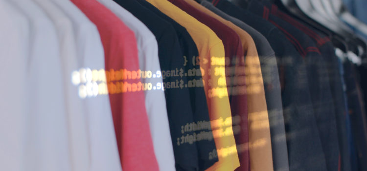 How dress codes reinforce systemic violence Image of t-shirts on a clothing rack, with a second graphic of computer code layered over top.