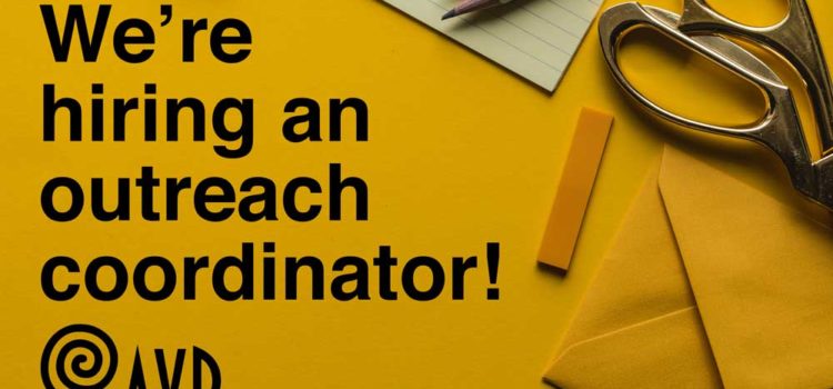 *Closed* We’re hiring an Outreach Coordinator! Photo of yellow desk with the words "We're hiring an outreach coordinator" in bold along with the Anti-Violence Project logo