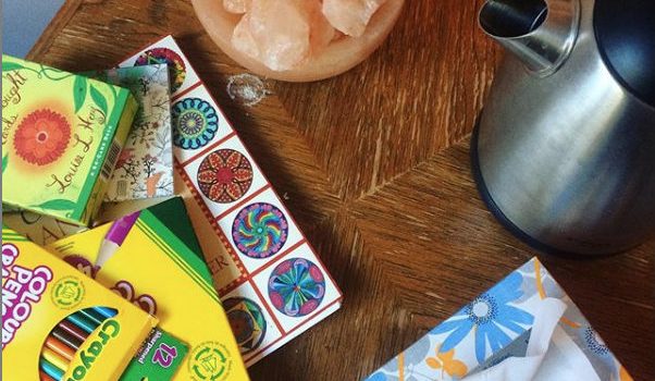 Winter/Spring 2019 Term Summary Photo of a table with several items on it including a kettle, a box of kleenex, colouring supplies and a salt lamp.