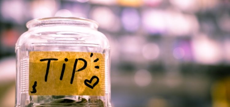 11 Guaranteed Sexual Assault Prevention Tips Photo of a tip jar filled with money